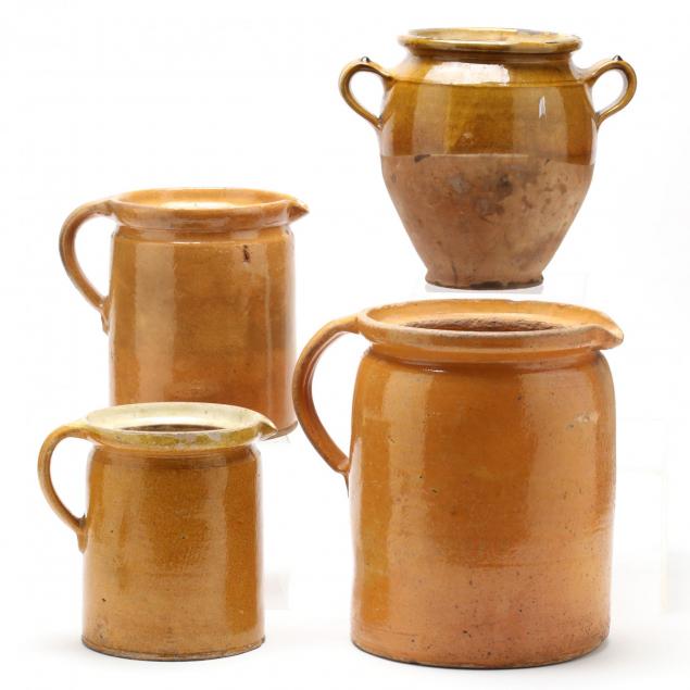 group-of-four-utilitarian-stoneware-pottery-vessels