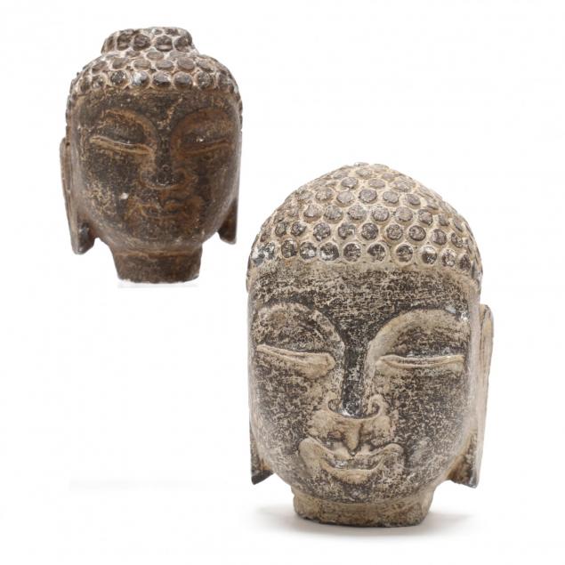 two-carved-stone-buddha-heads