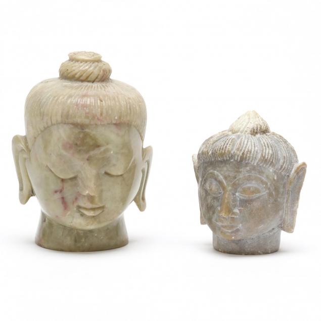 two-carved-stone-heads-of-buddha