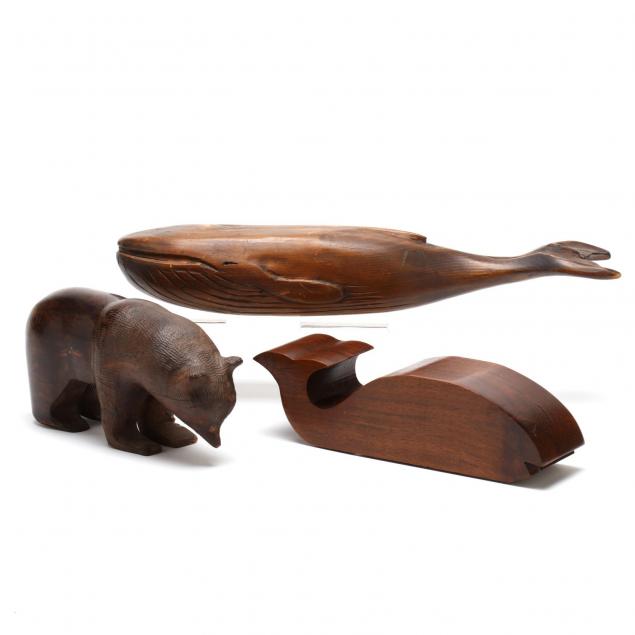 three-carved-wood-animals