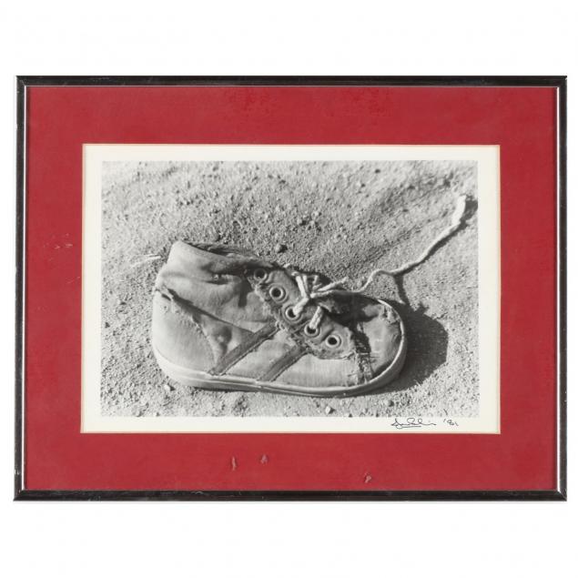 framed-photograph-of-a-child-s-shoe