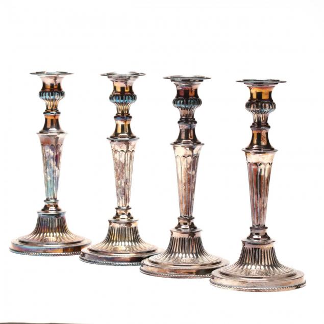 a-set-of-four-georgian-style-silverplate-candlesticks