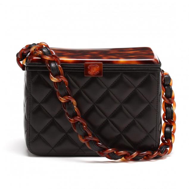 box-leather-handbag-with-tortoise-lucite-chanel
