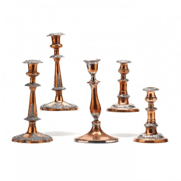 group-of-antique-copper-candlesticks