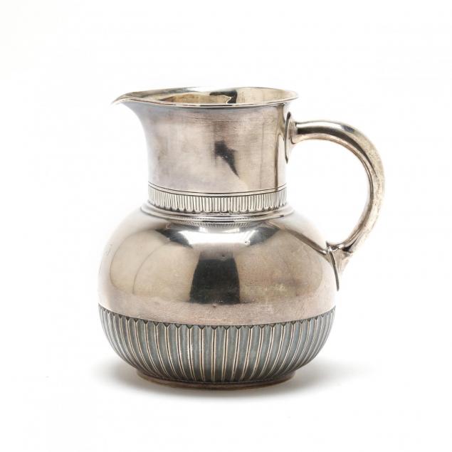 an-antique-sterling-silver-water-pitcher-by-whiting