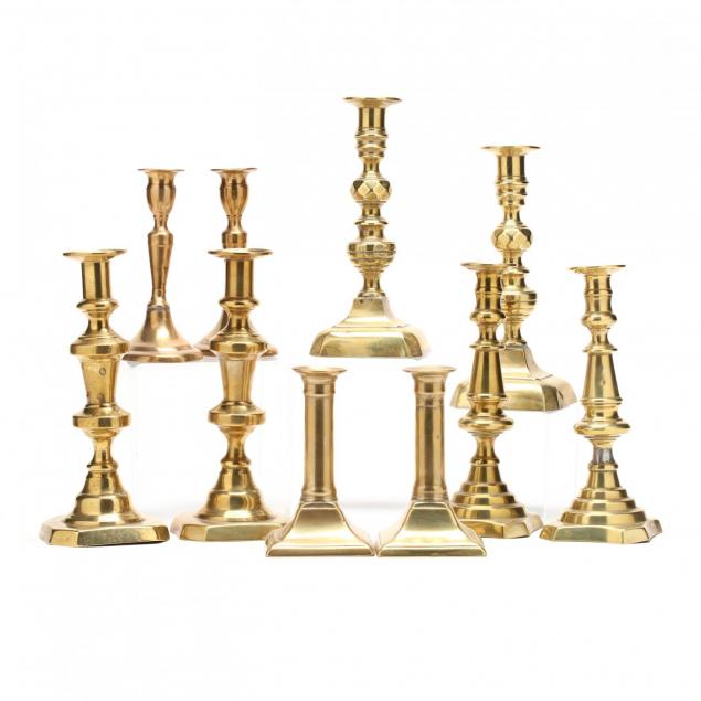 five-pair-of-antique-brass-push-up-candlesticks