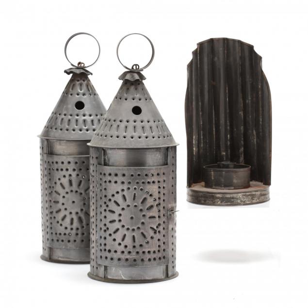 three-primitive-tin-candle-lanterns