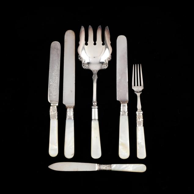 a-collection-of-silver-flatware-with-mother-of-pearl-handles