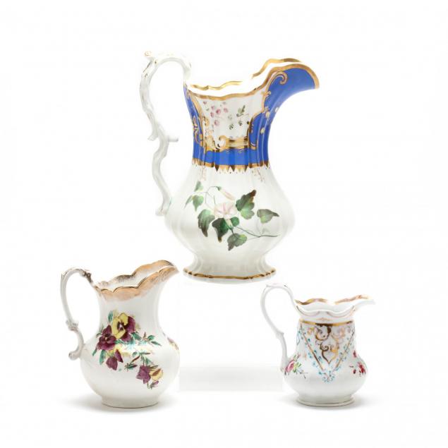 three-porcelain-pitchers