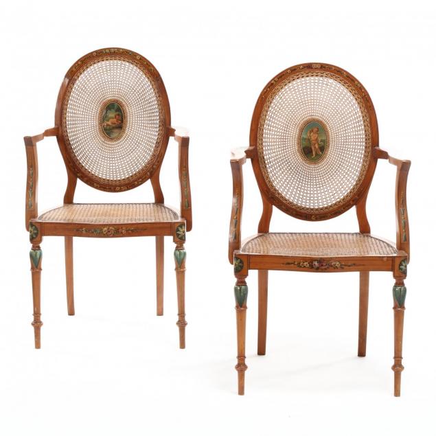 pair-of-adam-style-caned-arm-chairs