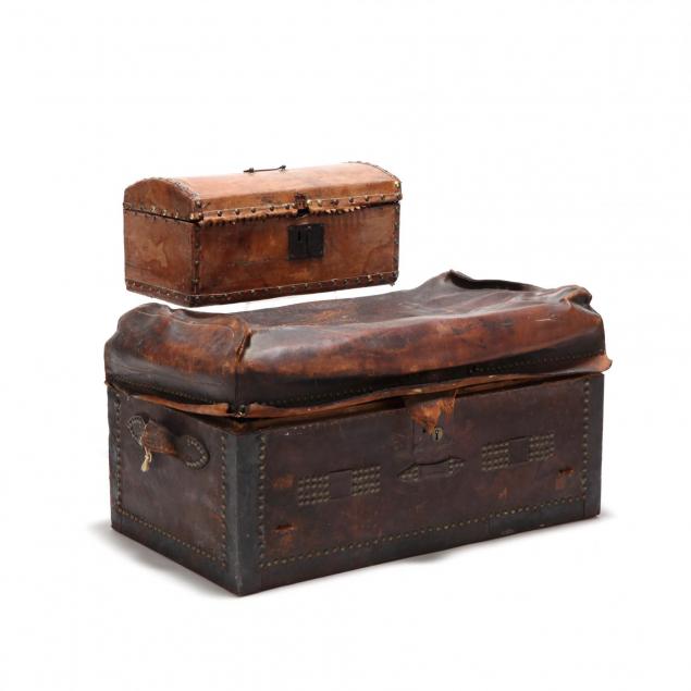 two-antique-leather-covered-traveling-trunks