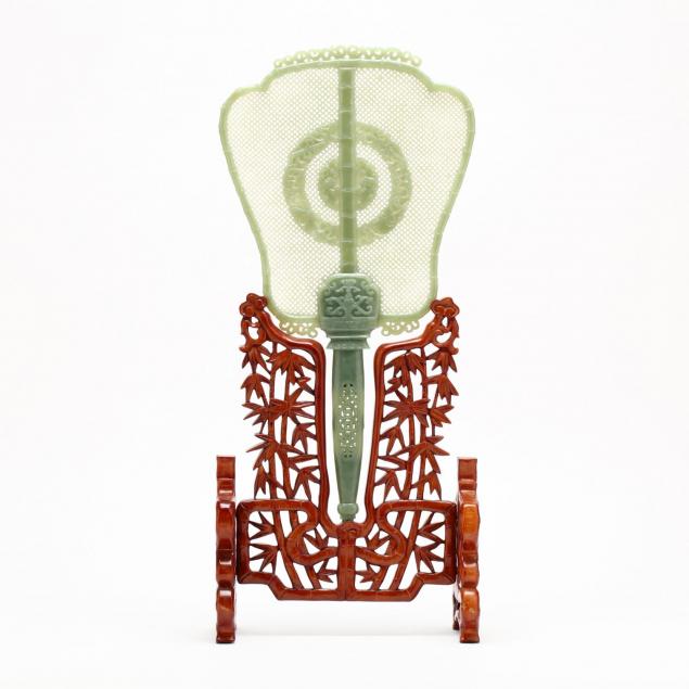 a-chinese-jade-fan-in-carved-wooden-bamboo-stand