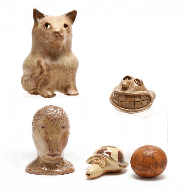 a-group-of-pottery-miniatures