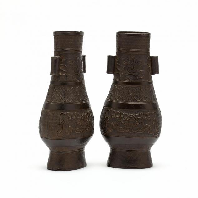 a-pair-of-asian-archaic-style-bronze-vases