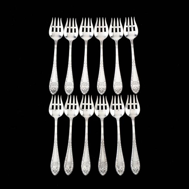 a-set-of-twelve-dominick-haff-marie-antoinette-sterling-silver-ramekin-forks