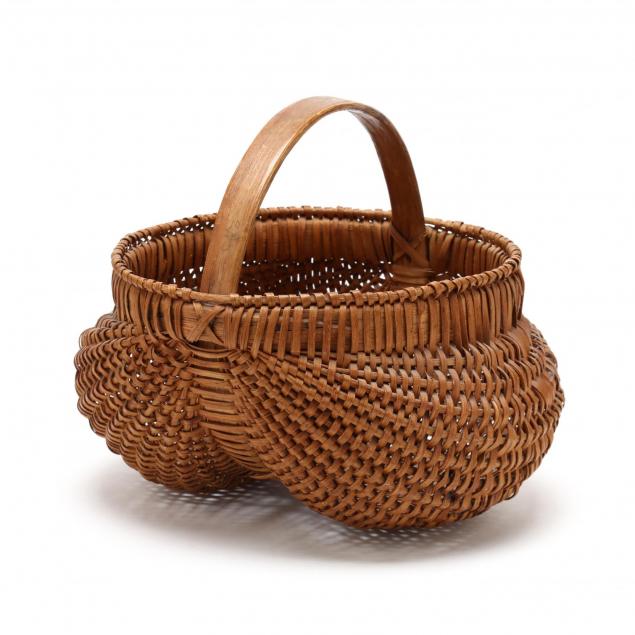 an-antique-buttocks-basket
