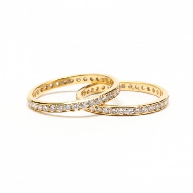 pair-of-18kt-gold-and-diamond-eternity-bands