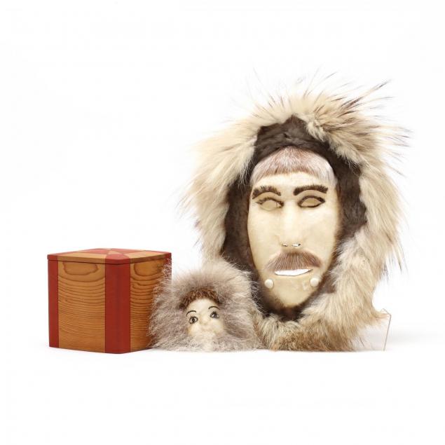 two-inuit-masks-and-a-covered-box