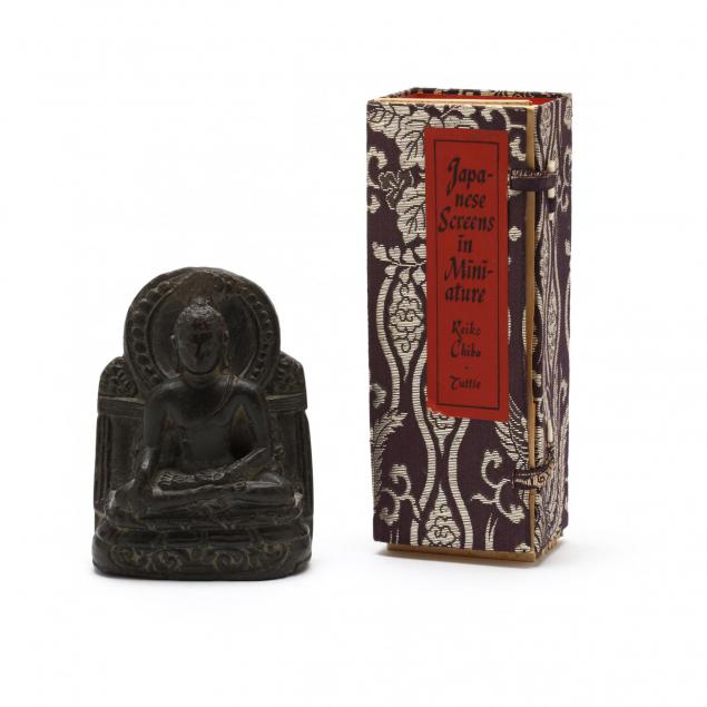 a-small-seated-buddha-statue-and-miniature-japanese-screens