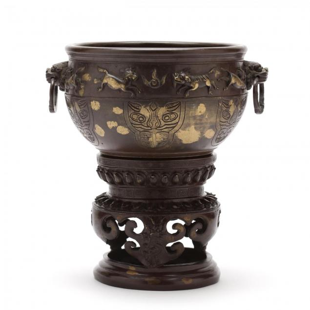 a-chinese-gilt-splashed-bronze-censer-and-stand