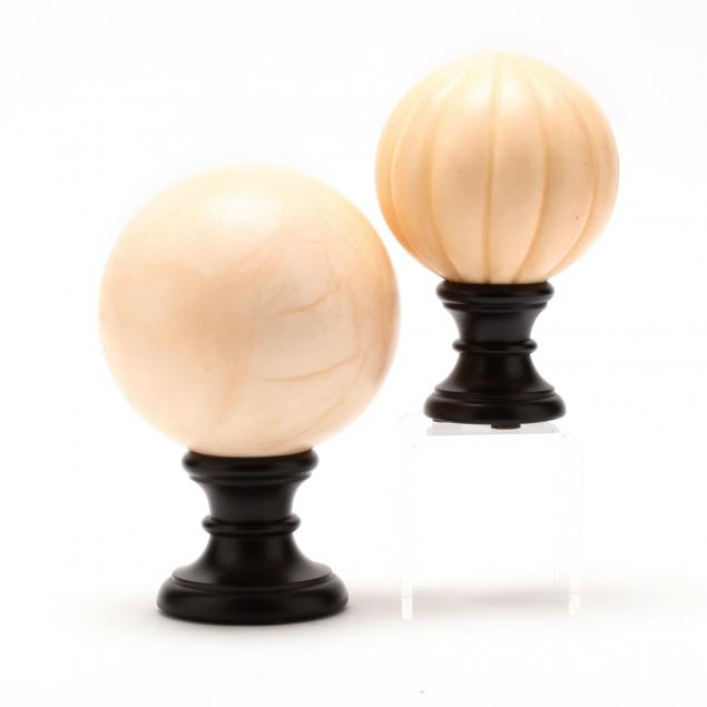 two-carved-alabaster-orbs