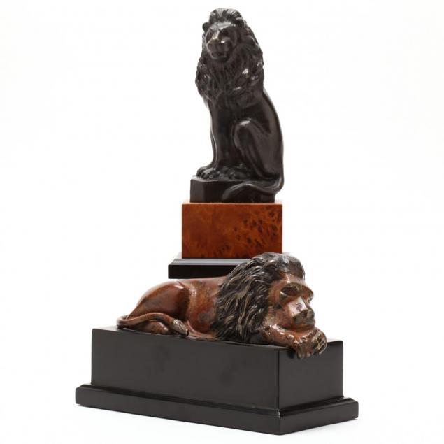 two-contemporary-lion-statuettes