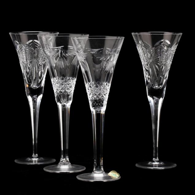 a-set-of-four-waterford-crystal-toasting-flutes
