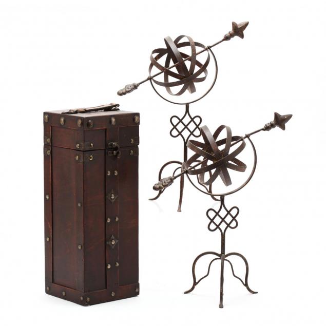 a-pair-of-iron-armillary-spheres-and-a-storage-box