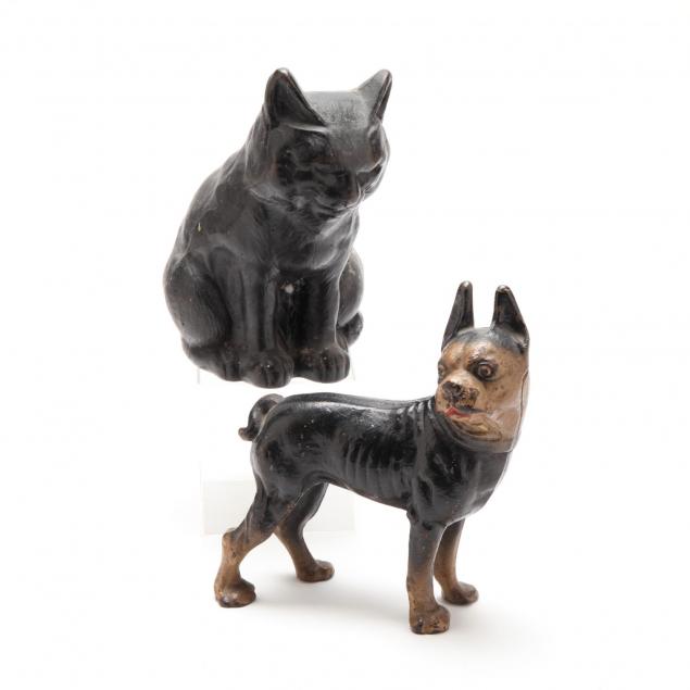 two-antique-cast-iron-animal-doorstops