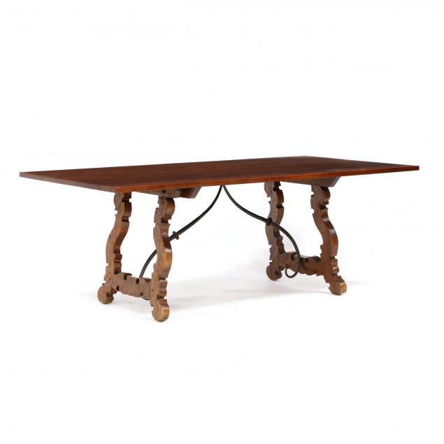 spanish-style-carved-trestle-base-dining-table
