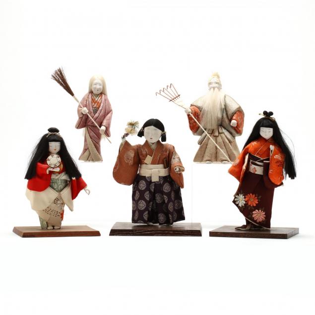 a-group-of-five-japanese-dolls