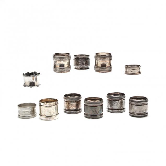 an-assembled-set-of-eleven-antique-silverplate-napkin-rings