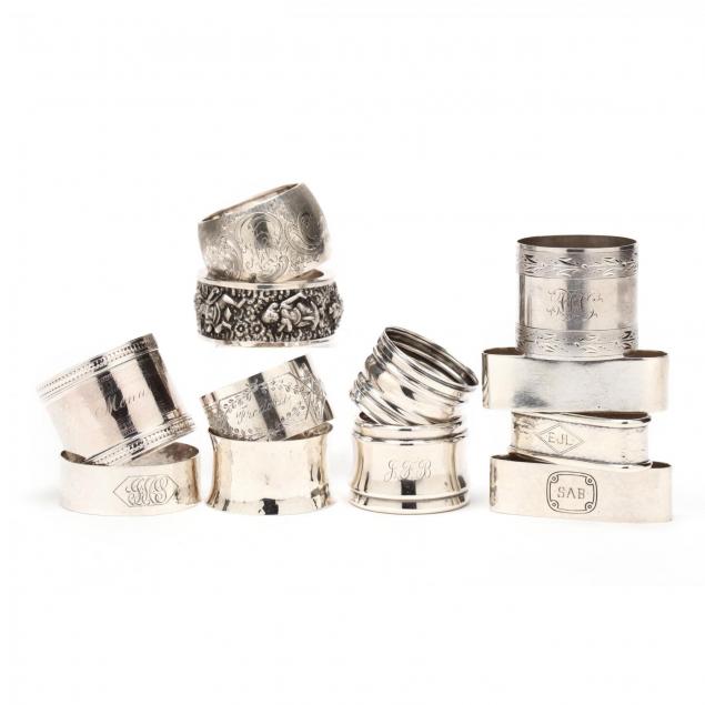 an-assembled-set-of-twelve-sterling-silver-napkin-rings