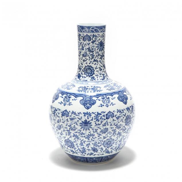 a-very-large-chinese-blue-and-white-bottle-vase