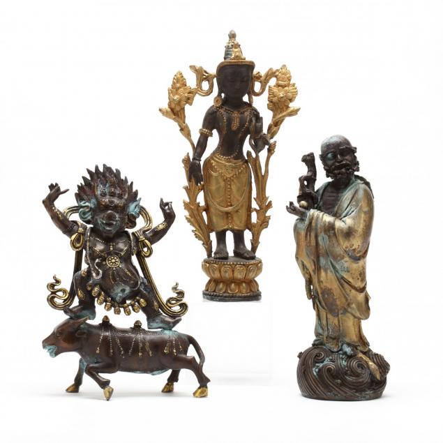 three-buddhist-sculptures