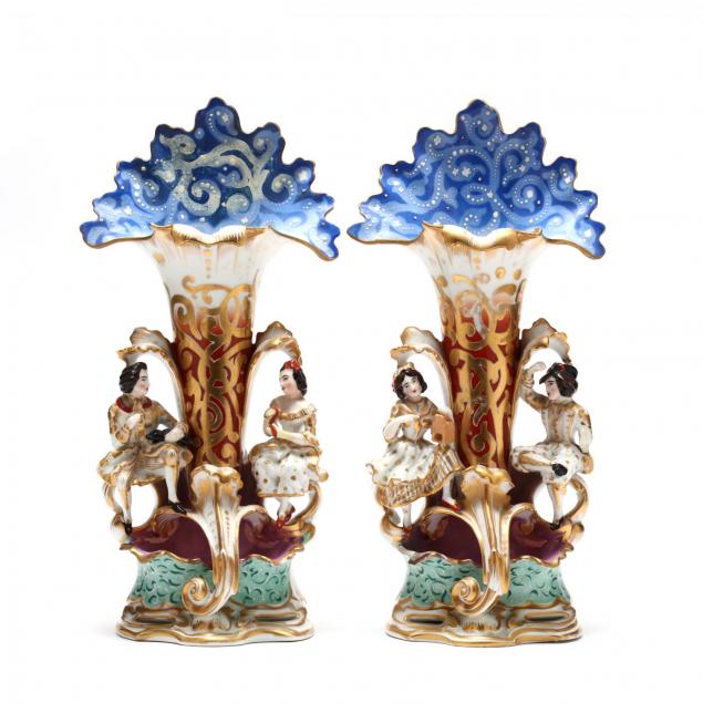 a-pair-of-figural-spill-vases