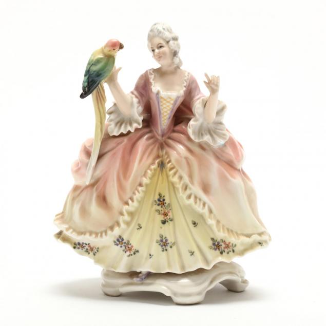 karl-ens-porcelain-figure-of-a-lady-and-parrot