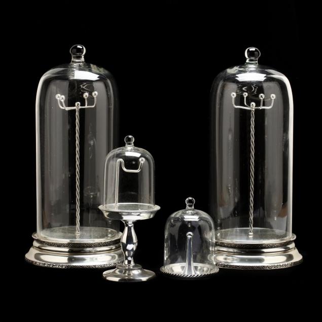 four-contemporary-bell-jar-jewelry-displays