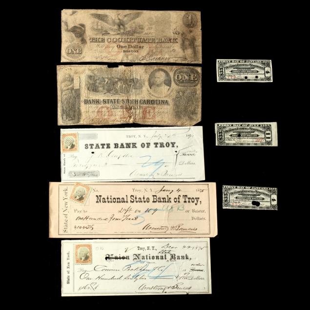 two-broken-bank-notes-and-financial-ephemera