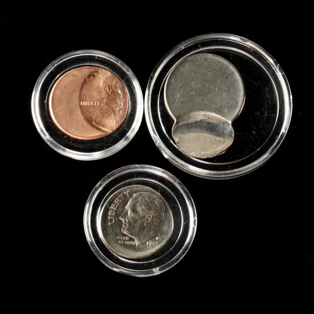 three-off-center-u-s-mint-error-coins