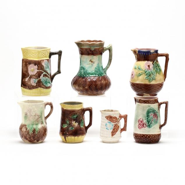 group-of-seven-majolica-pitchers