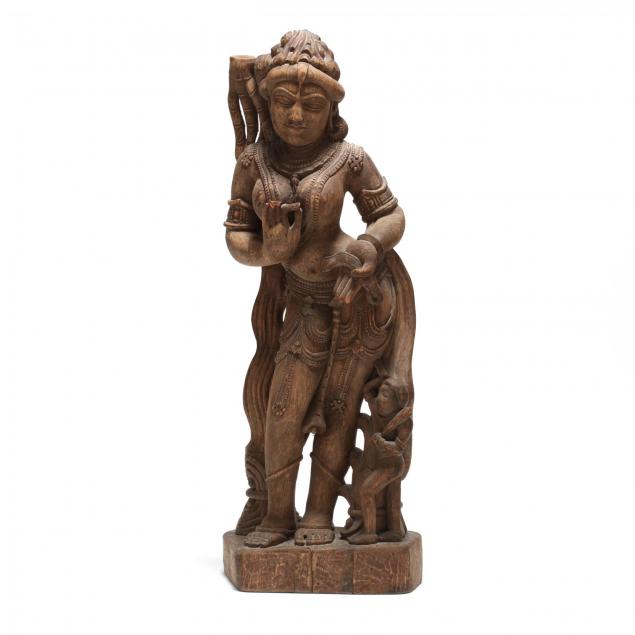 a-carved-wooden-yakshi-sculpture