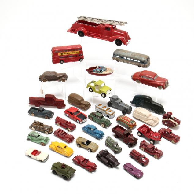an-assortment-of-vintage-toy-vehicles