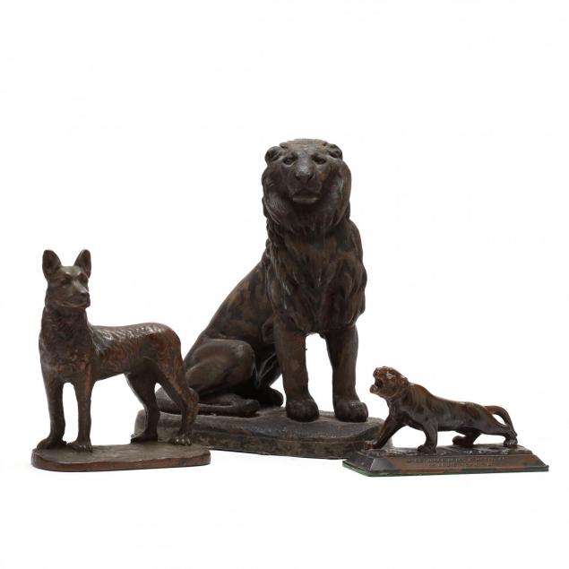 three-vintage-cast-metal-animals