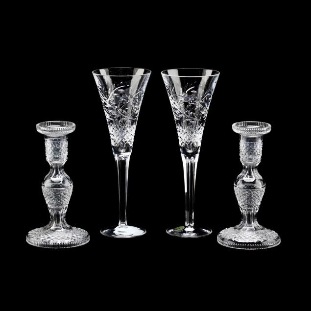 a-pair-of-waterford-crystal-toasting-flutes-and-a-pair-of-candlesticks