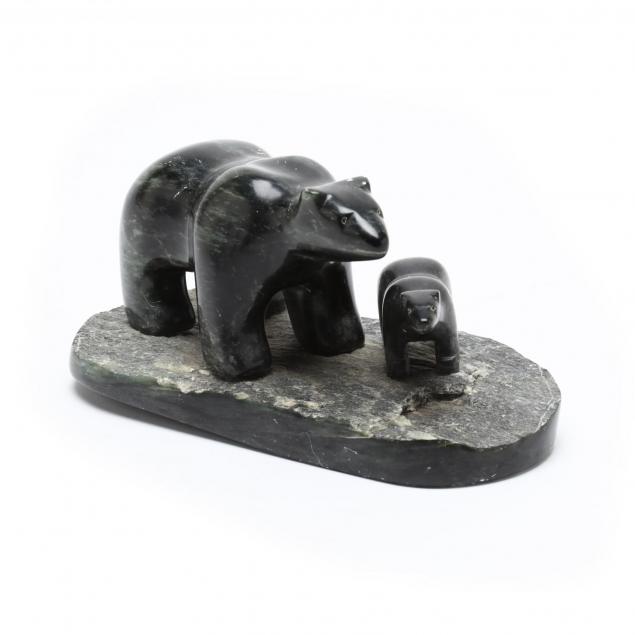 carved-stone-sculpture-of-polar-bear-and-cub
