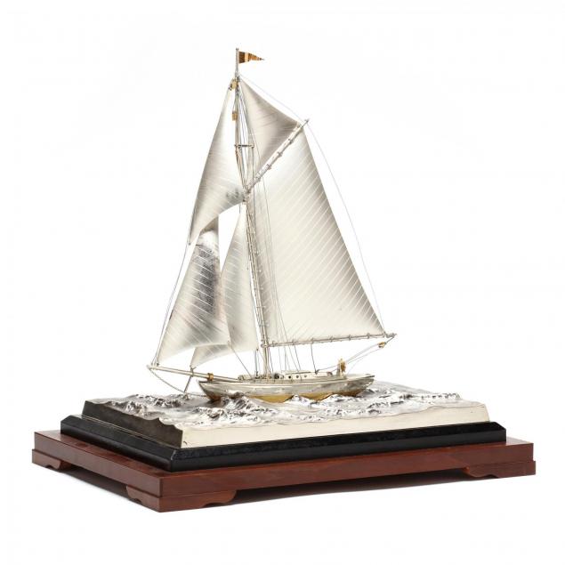a-fine-silver-model-of-a-sailboat