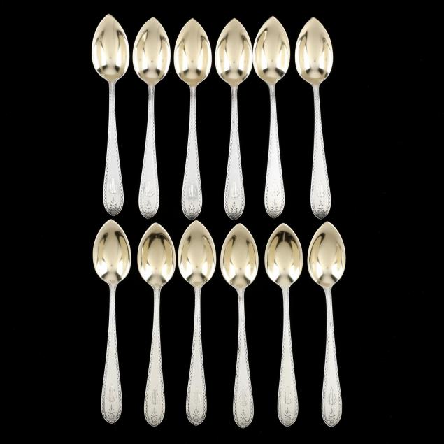 set-of-twelve-sterling-silver-parcel-gilt-fruit-spoons-by-gorham