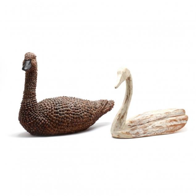 two-decorative-swan-decoys
