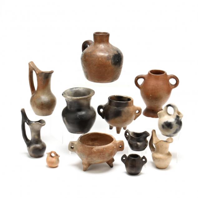 a-group-of-twelve-catawba-pottery-vessels
